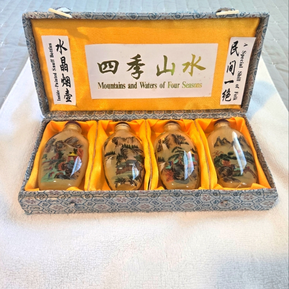 Four Inside painted snuff bottles Mountains and water scenes